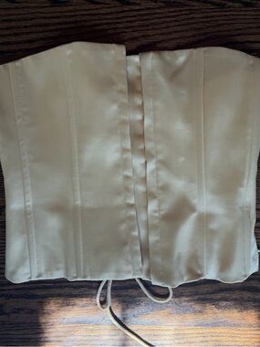 Danielle Guizio satin corset in light yellow